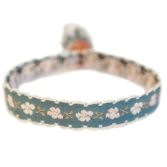 Bracelet tissé fleur de coton gris/bleu