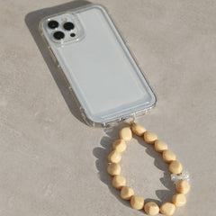 Telefoonsieraad bowtie pearl beige