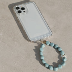 Telefoonsieraad bowtie pearl blue