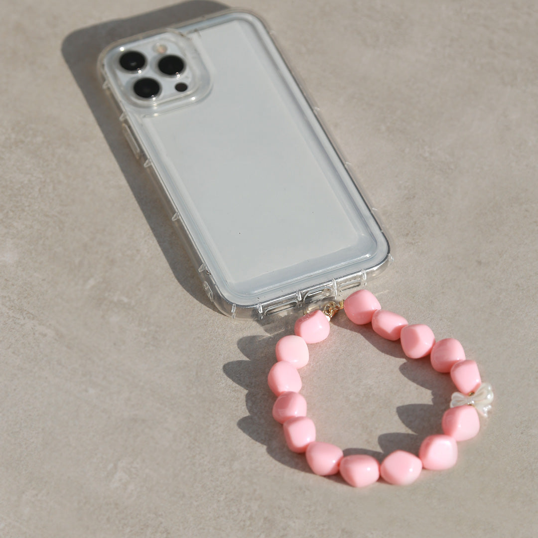 Telefoonsieraad bowtie pearl pink