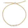 Le bracelet love doré beige