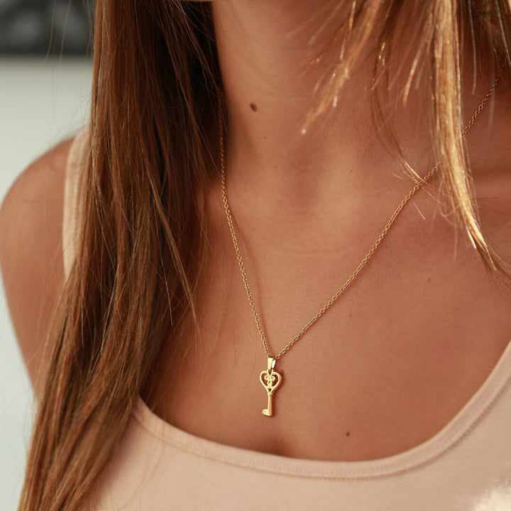 Gouden ketting heart key