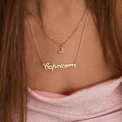 Gold necklace capricorn