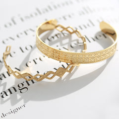 Gouden bangle cosmic